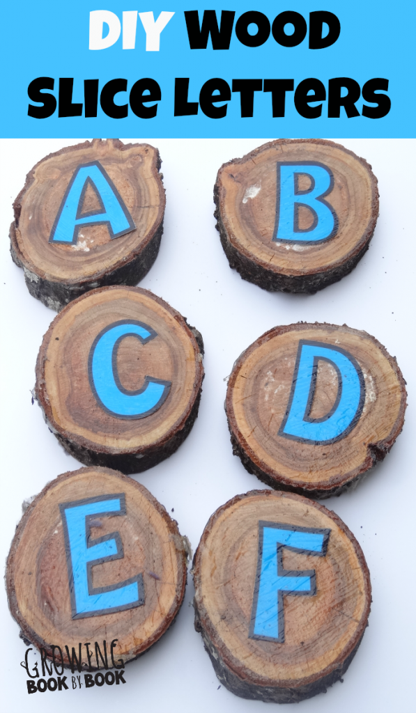Learning the alphabet with DIY wood slice alphabet blocks from growingbookbybook.com