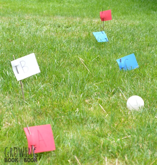 Play flag stick fit ball! It's a fun alphabet activity for kids.