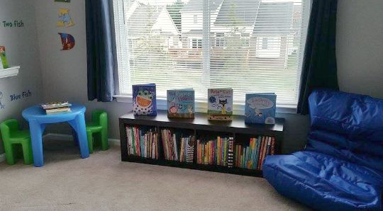 Create a reading nook with a low bookshelf.