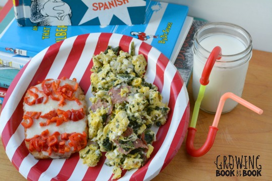 A yummy Dr. Seuss breakfast with green eggs and ham and cat in the hat hash browns
