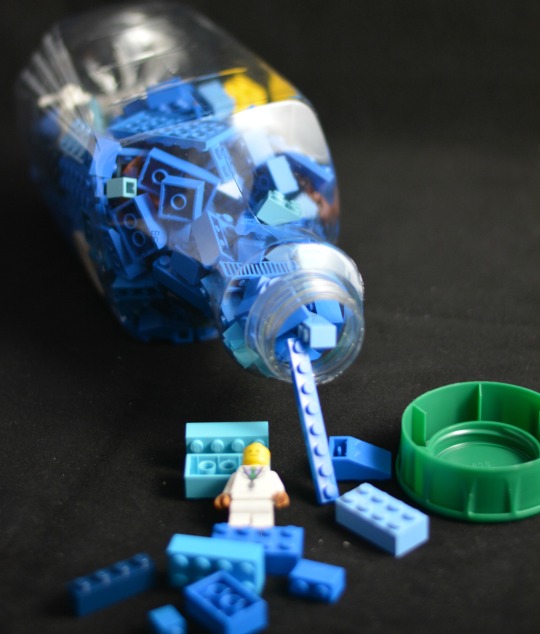 fill the jar with Lego for this literacy Lego activity