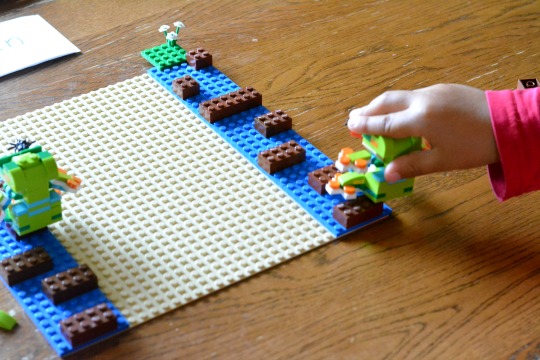 playing a new reader phonics game with Lego