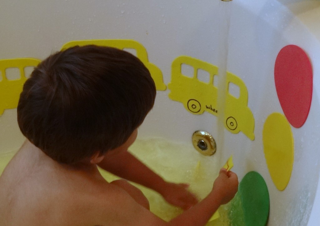 Build litreracy in the bath with wheels on the bus from growingbookbybook.com