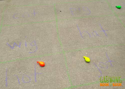 Word Family Game using balloon bean bags from growingbookbybook.com