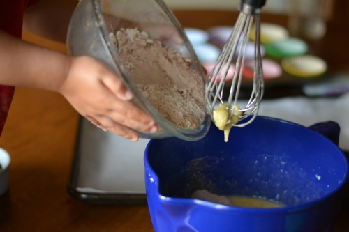 mixing the batter for hot chocolate banana muffins