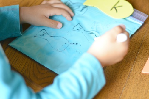 preschool writing activities: writing on a bag of Oobleck