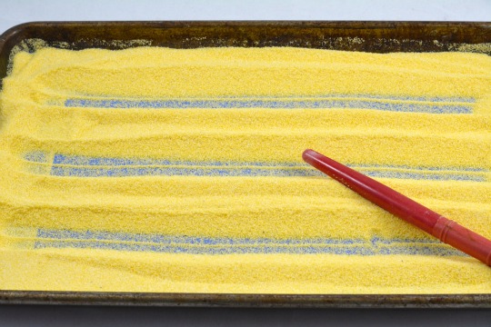 making straight lines in a sensory tray