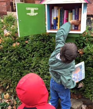 dropping off books at the Little Free Library
