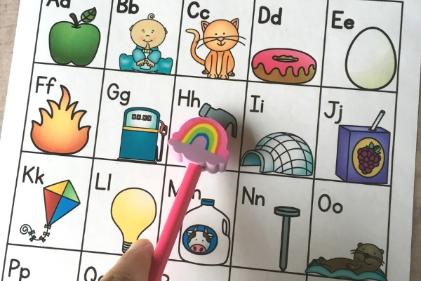 using a pointer to read an alphabet chart